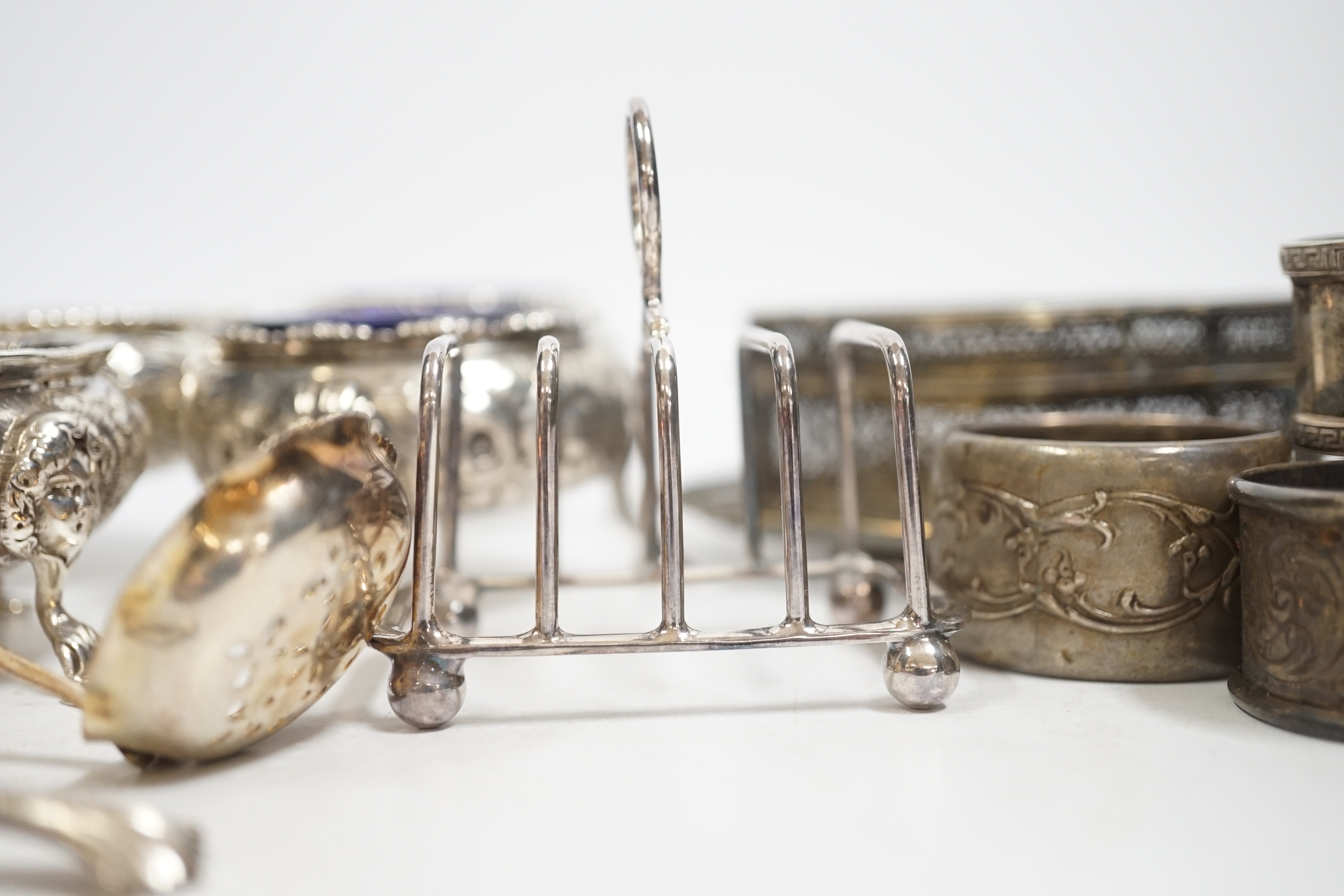 Five assorted Georgian silver bun salts and sundry small silver wares including napkin rings, flatware and white metal items.